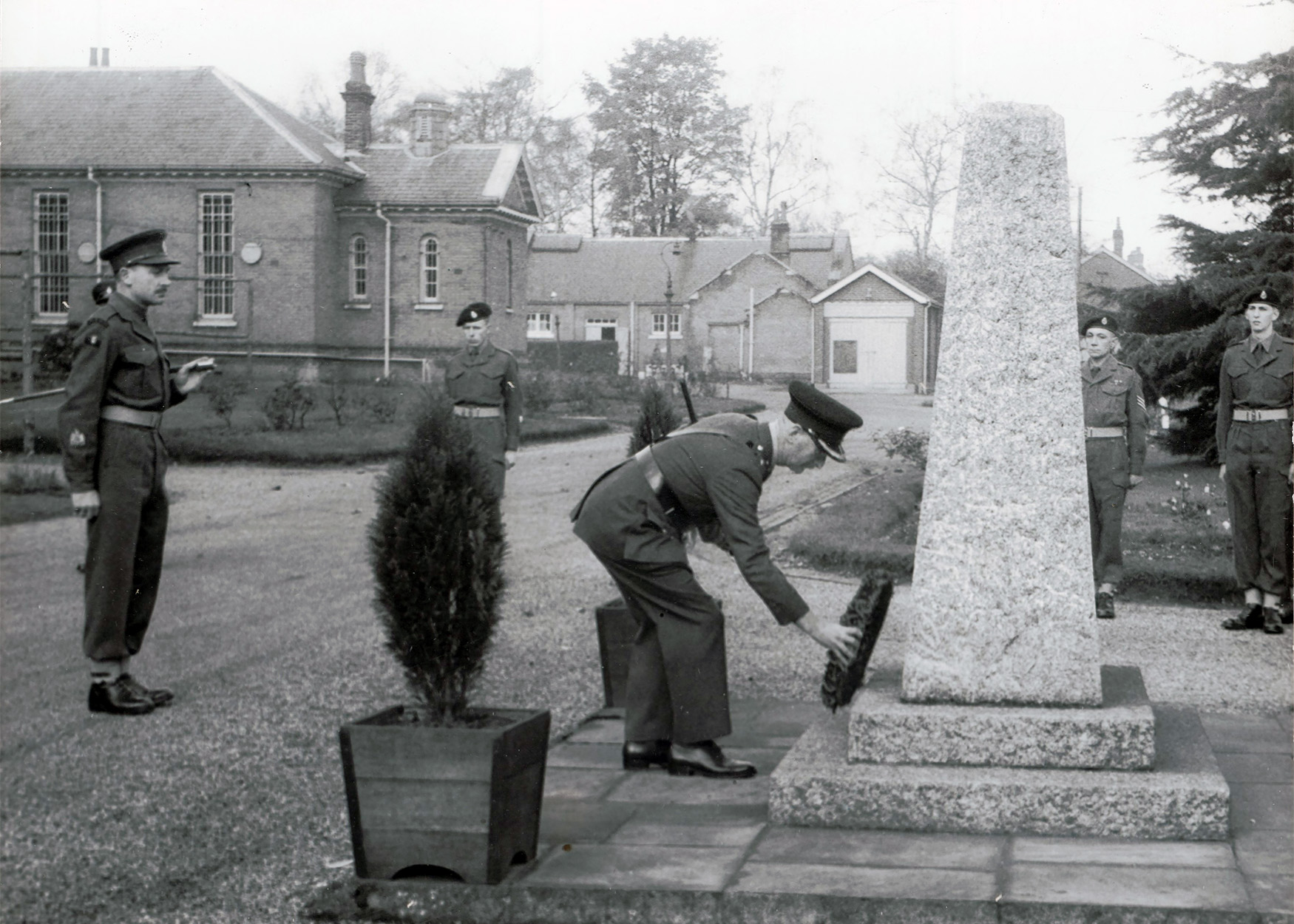 wreath laying ceremony at the memorial in the old Depot at Connaught Bks